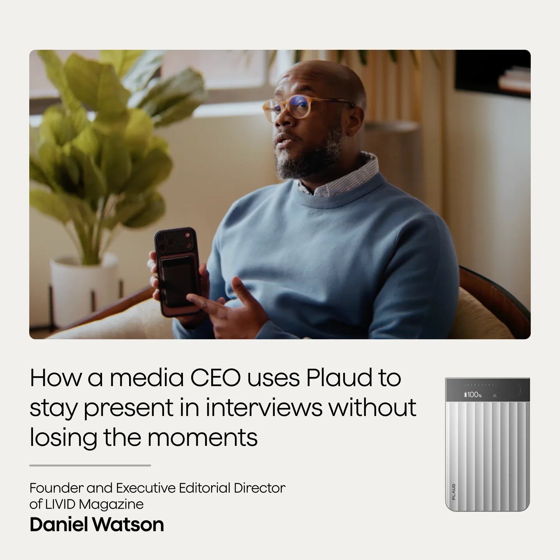 Daniel Watson, CEO of LIVID Magazine, uses a silver Plaud Note Pro to stay present in interviews. He sits, looking engaged.