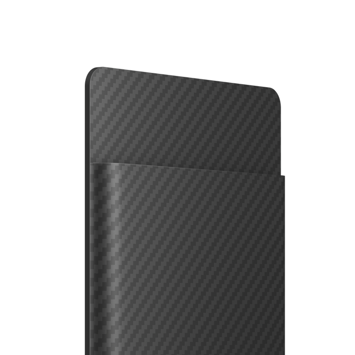 Dark grey Plaud Note Pro, a thin card AI voice recorder, showing its carbon fiber pattern.