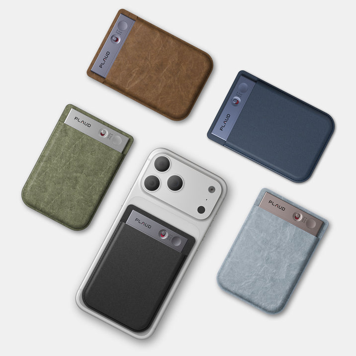 Five Plaud Note devices in brown, olive green, navy blue, light blue, and black, one attached to a white phone case.