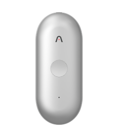 A silver Plaud NotePin S wearable AI recorder features a round button and a chevron logo on its front face.