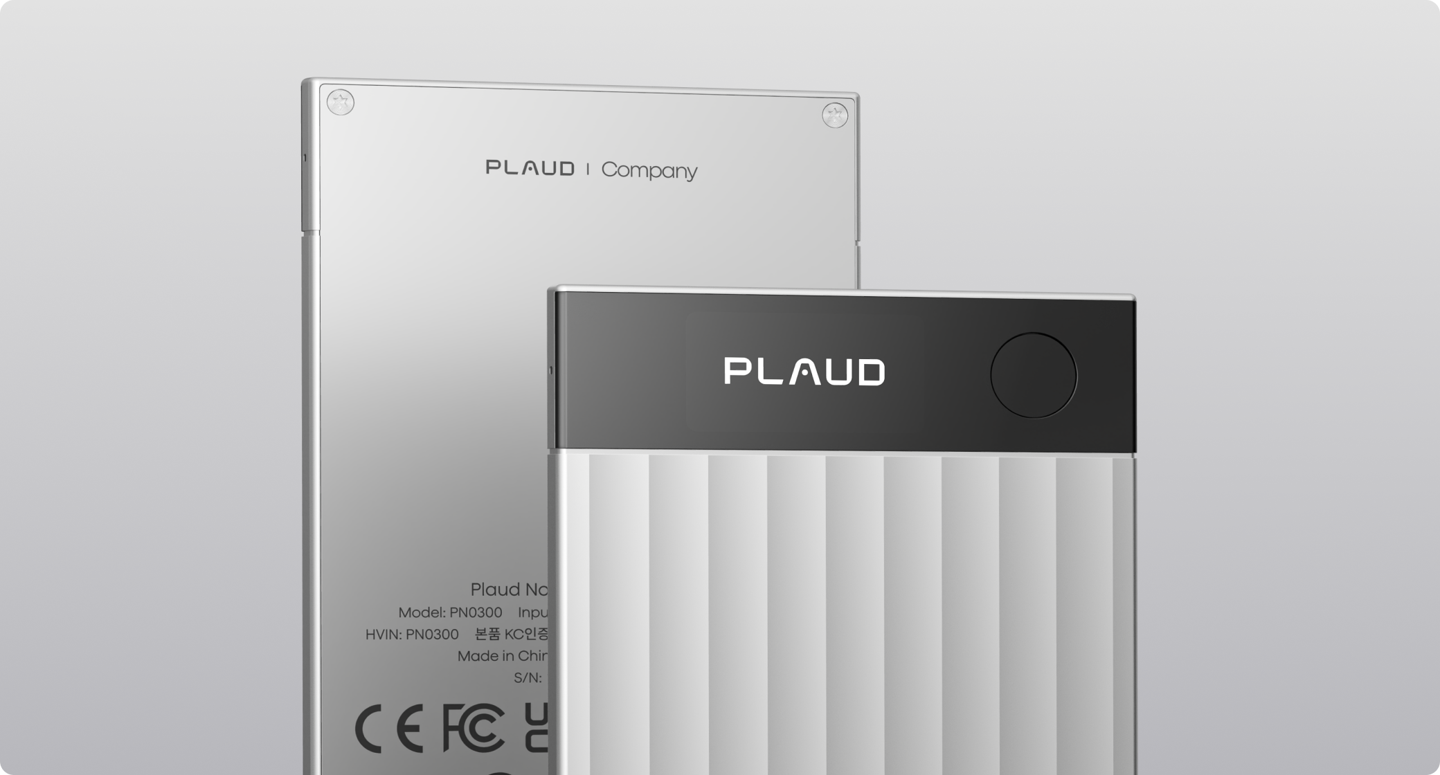 Silver Plaud Note Pro with ribbed body and black top, next to a silver Plaud Note card with 'PLAUD | Company' text.