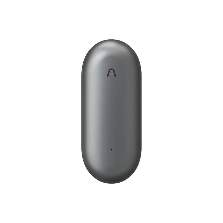 Dark gray Plaud NotePin, a smooth, capsule-shaped AI voice recorder with a small Plaud logo and microphone.
